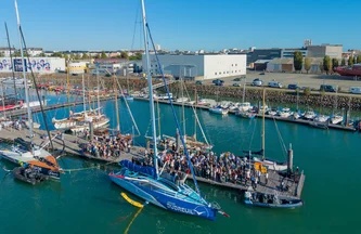 Vue aérienne du baptême de l'IMOCA Groupe Dubreuil 2 sur le ponton du Vendée Globe aux Sables-d'Olonne